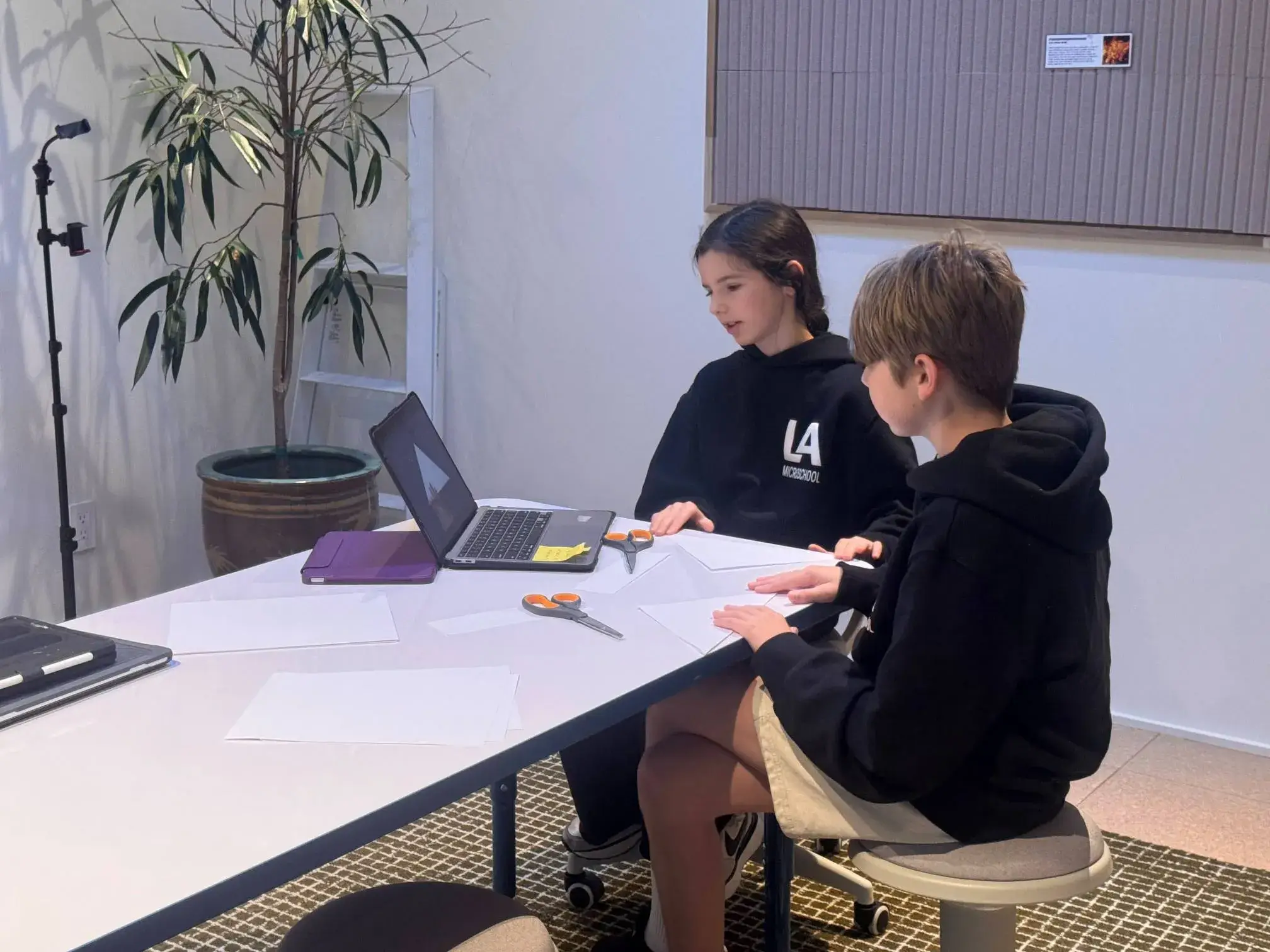 Students solving problem-based math equations using Phillips Exeter methods